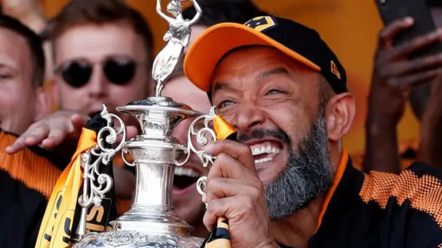 Wolverhampton Wanderers manager Nuno Espirito Santo celebrates with the trophy