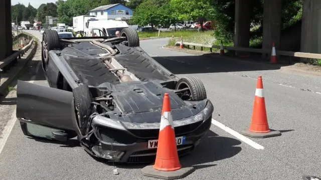 Overturned car on road