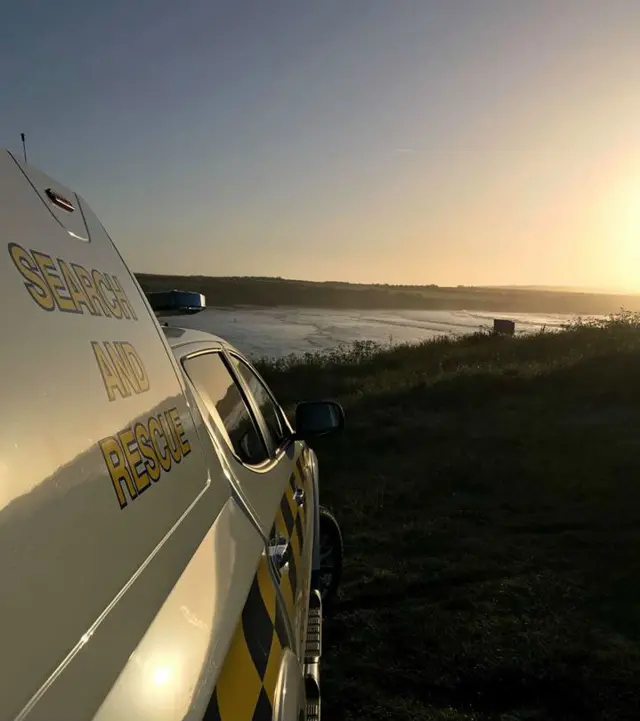 coastguard vehicle overlooking a bay