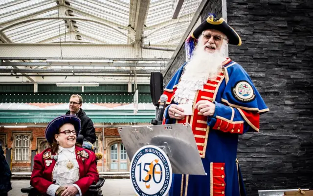 Town crier opening railway station improvements