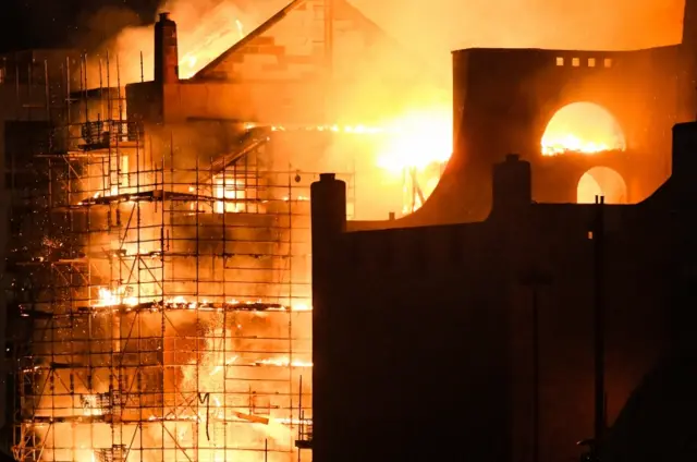 Fire fighters battle a blaze at the Mackintosh Building at the Glasgow School of Art for the second time in four years on June 16, 2018