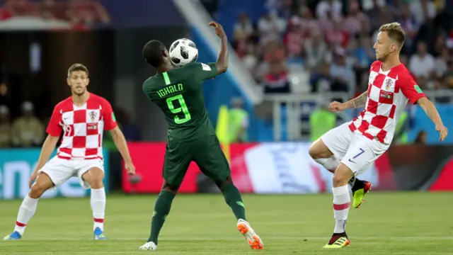 Ivan Rakitic (R) of Croatia and Odion Ighalo of Nigeria