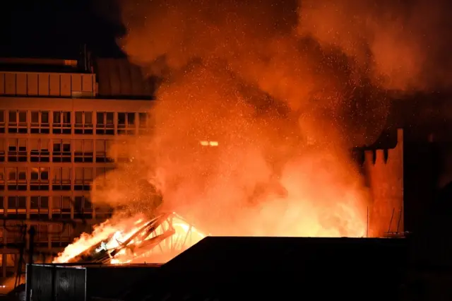 Firefighters battle a blaze at the Mackintosh Building at the Glasgow School of Art