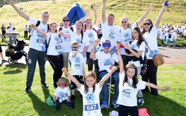 Group wearing MND Scotland tshirts