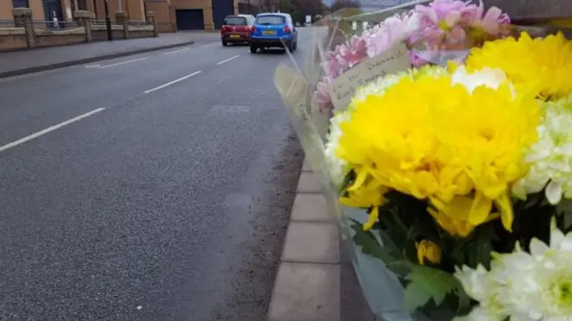 Flowers at the scene of the crash