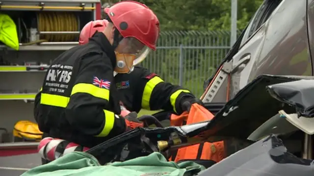 Firefighters taking part in The Extrication Challenge in Ripley