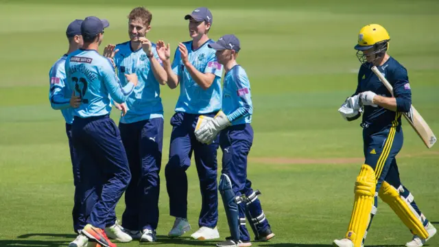 Yorkshire celebrate Jimmy Adams wicket