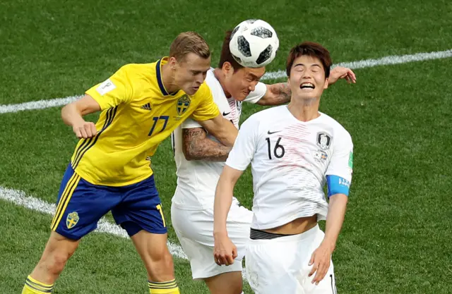 South Korea clear the ball.