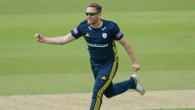 Liam Dawson celebrates the wicket of Tom Kohler-Cadmore