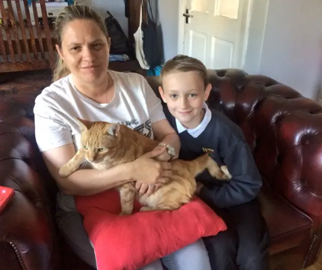 Ginger cat and owner Annette