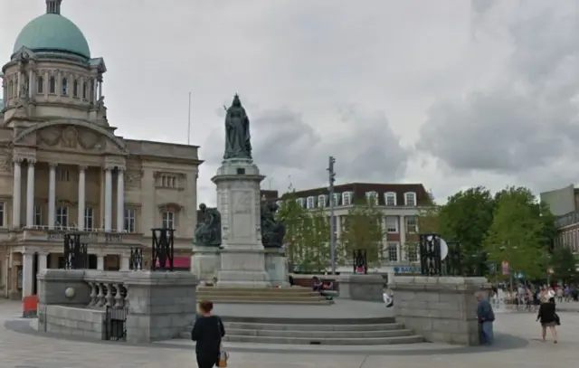 The statue in Queen Victoria Square.