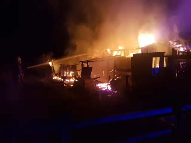 Allotment sheds on fire