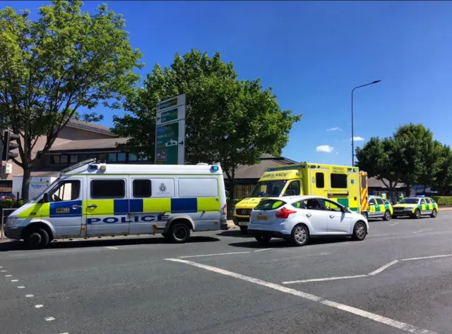 Ambulance and Police cars.