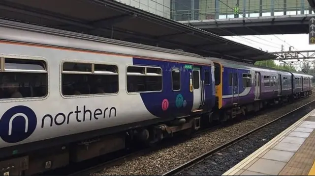 A Northern train at a station.