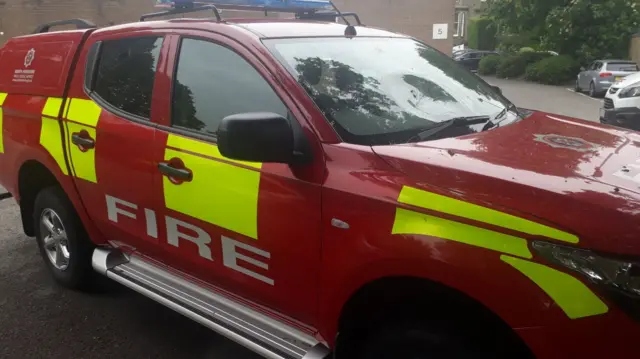 Fire car with damaged windscreen