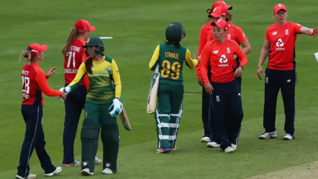 England and South Africa shake hands at the end of the game