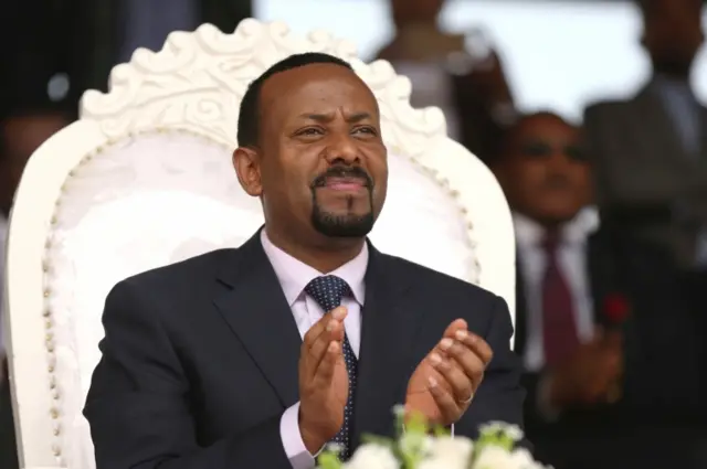 Ethiopia"s newly elected prime minister Abiy Ahmed attends a rally during his visit to Ambo in the Oromiya region