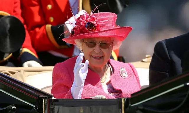 The Queen arriving at Ascot in a carriage