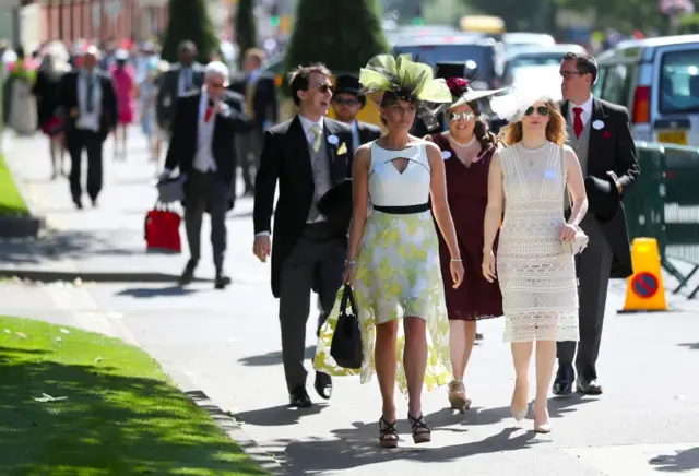 Racegoers arriving