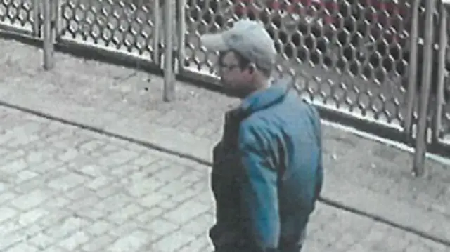 Man pictured on CCTV wearing a cap