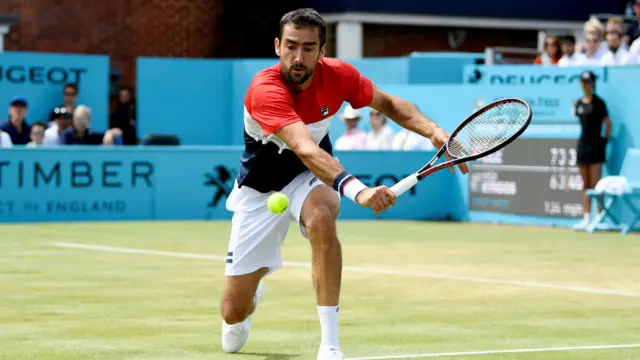 Marin Cilic holds his service game