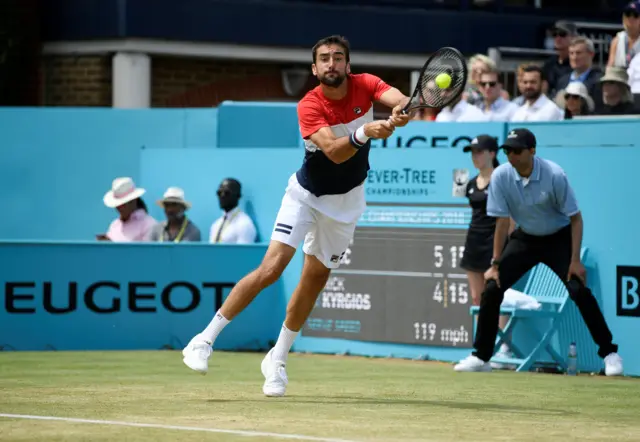 Cilic returns to hold his service game in the first set