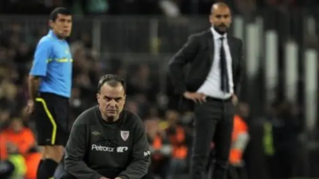 Marcelo Bielsa with Pep Guardiola in the background