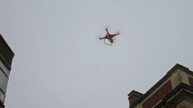 The drone being flown