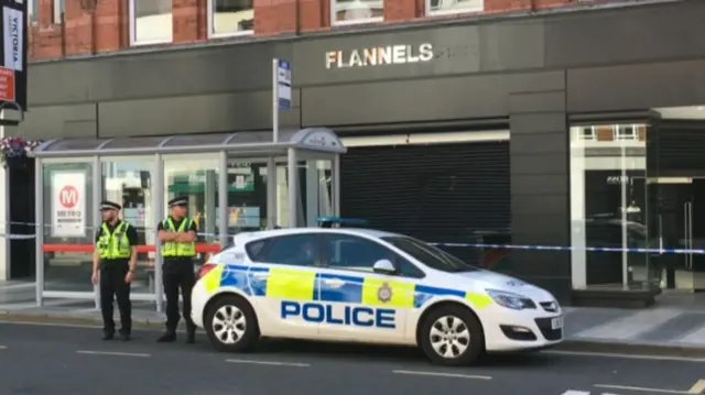 Police outside Flannels