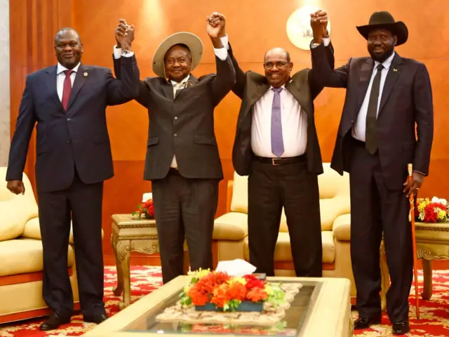 From left to right, South Sudan's opposition leader Riek Machar, Ugandan President Yoweri Museveni, Sudanese President Omar al-Bashir and South Sudanese President Salva Kiir, pose for a group picture before their meeting in khartoum on June 25, 2018.