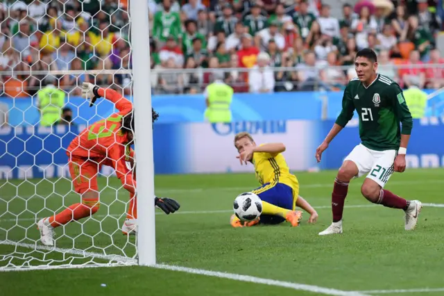 Edson Alvarez of Mexico scores an own goal to put Sweden 3-0