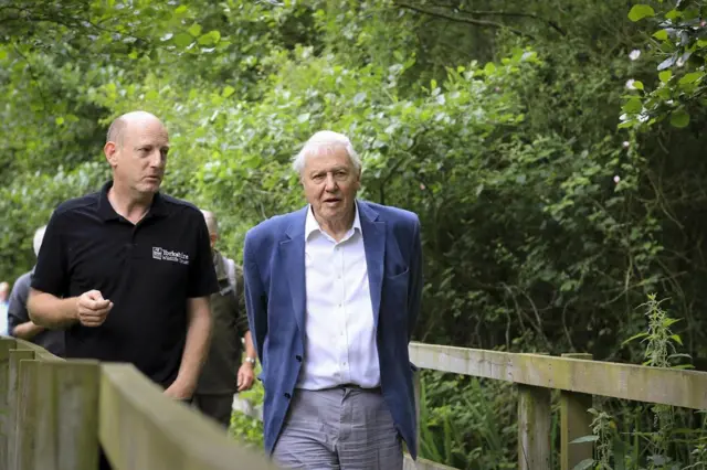 Sir David Attenborough being shown around Askham Bog