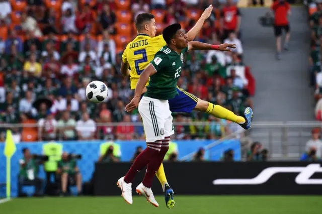 Mikael Lustig and Mexico's defender Jesus Gallardo