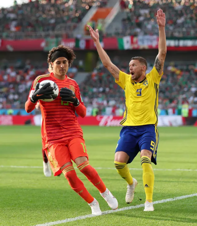 Guillermo Ochoa handles outside the area