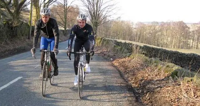 The Brownlee brothers riding bicycles