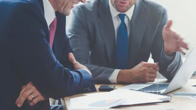 Two men in a meeting