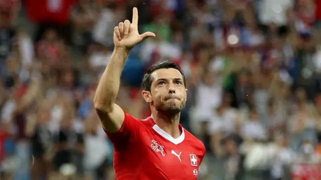 Switzerland's Blerim Dzemaili reacts