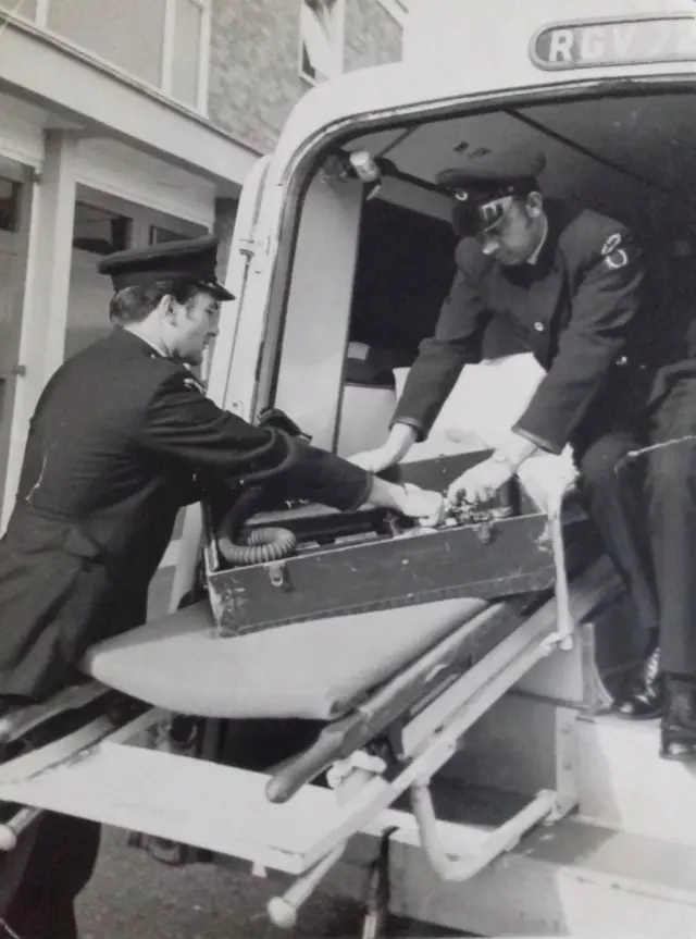 Ron Saddington reversing a mobile oxygen unit into an ambulance