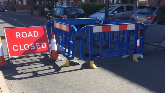 Road signs around sinkhole