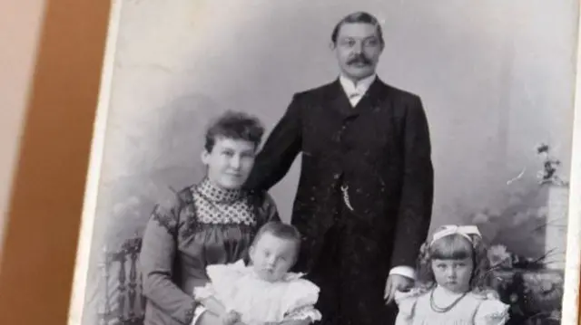 A black and white picture of Albert Stockwell and his family.