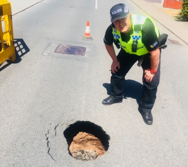 Hole in road