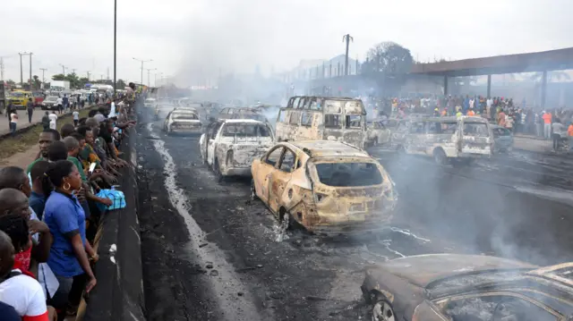 Burnt-out vehicles in Lagos, Nigeria