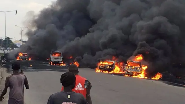 The burning vehicles in Lagos, Nigeria - 28 June 2018