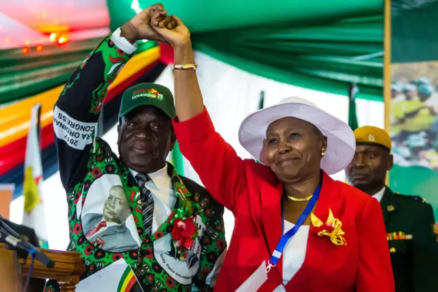 Zimbabwe's President Emmerson Mnangagwa Environment Minister Oppah Muchinguri-Kashiri (R) in December 2017