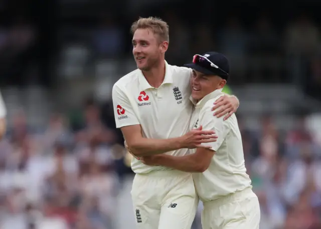 Stuart Broad and Sam Curran celebrate