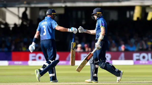 Sam Billings and Darren Stevens punch gloves