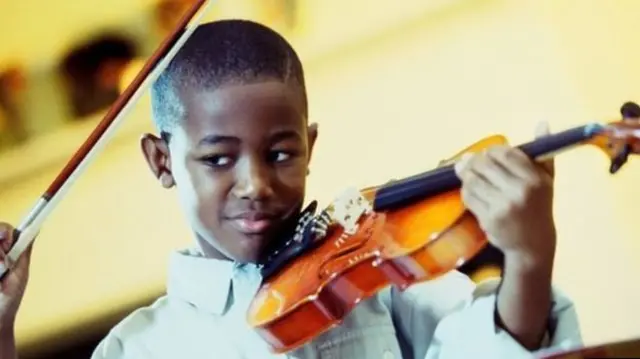 Child playing violin