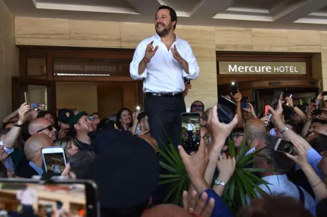 Italy"s new vice Prime Minister and Minister of the Interior, Matteo Salvini (C), delivers a speech to support Salvo Pogliese unseen)