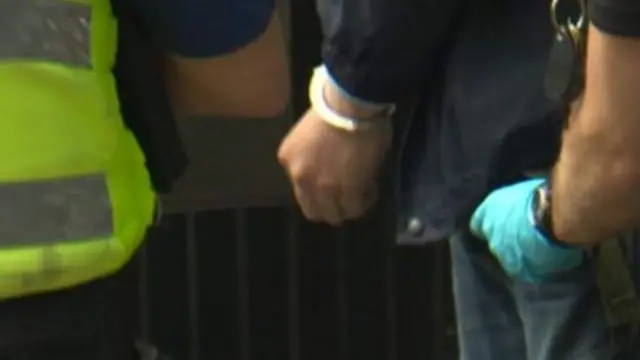 Anonymous person being arrested by Humberside Police