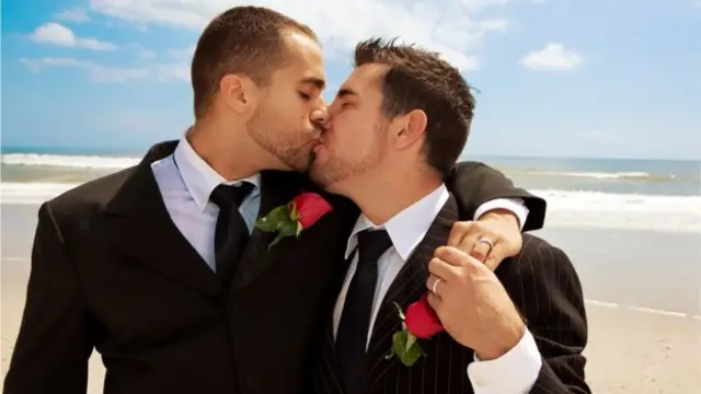 Men kissing